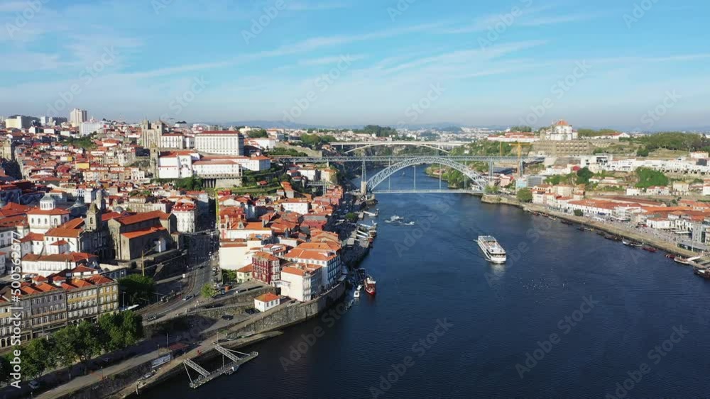 The Luis I Bridge in the historic city center of the city of Porto , Europe, Portugal, North, in summer on a sunny day. The Luis I Bridge in the historic city center of the city of Porto , Europe, Portugal, North, in summer on a sunny day.