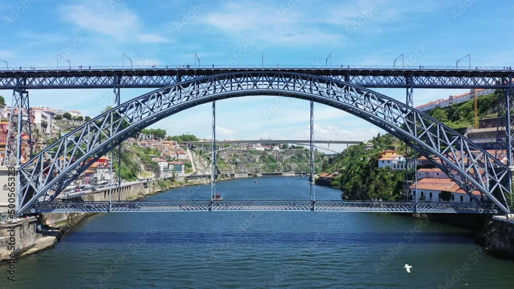 The Luis I Bridge in the historic city center of the city of Porto , Europe, Portugal, North, in summer on a sunny day.