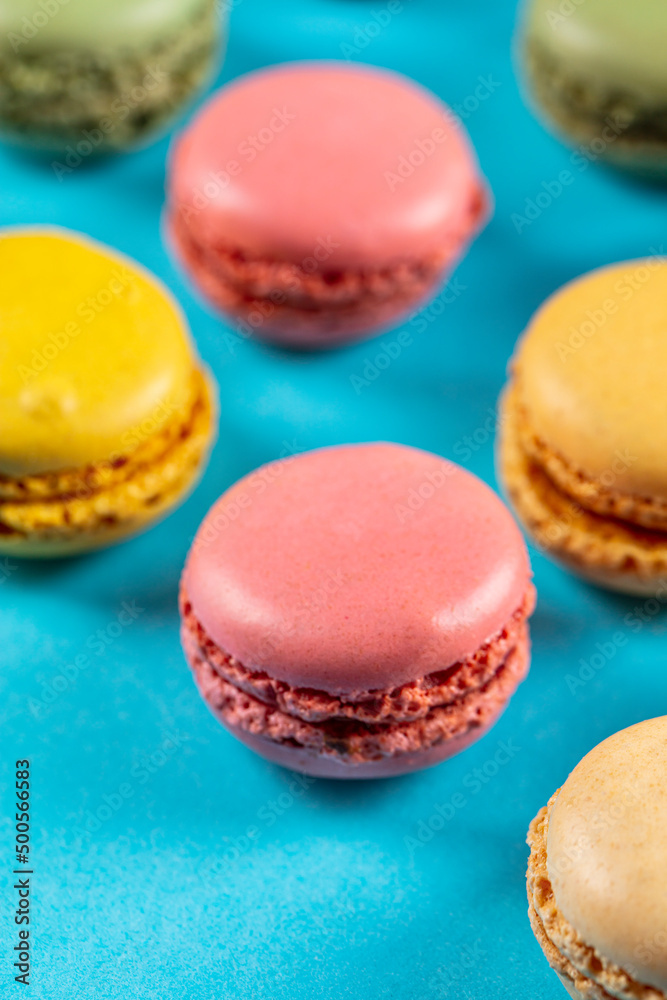 Close-up of macarons cakes of different colors .Culinary and cooking concept. Tasty colorful macaroons.