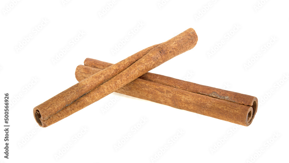 two cinnamon sticks isolated on white background two cinnamon sticks isolated on white background