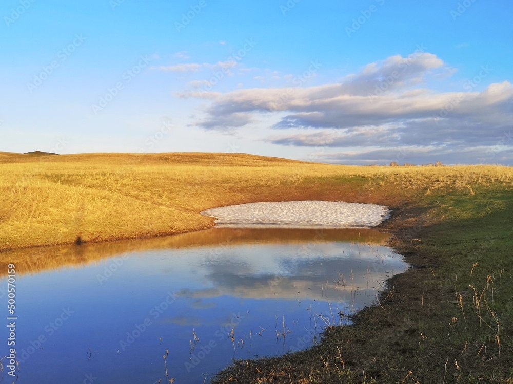 Minimalistic spring landscape with lake and sky Minimalistic spring landscape with lake and sky
