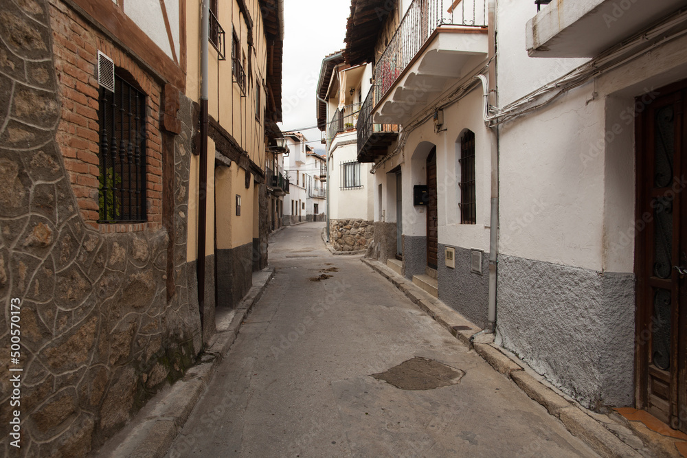 Narrow Spanish Village Street.  Taken in San Esteban del Valle.  Deserted because it's siesta time.
