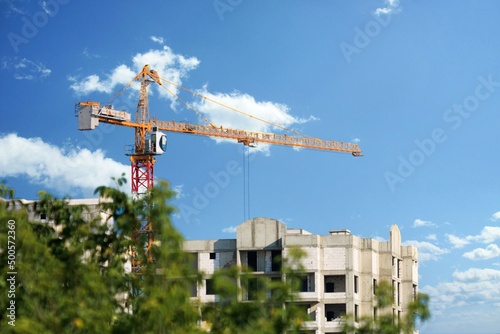 The architectural complex of residential buildings on sky background
