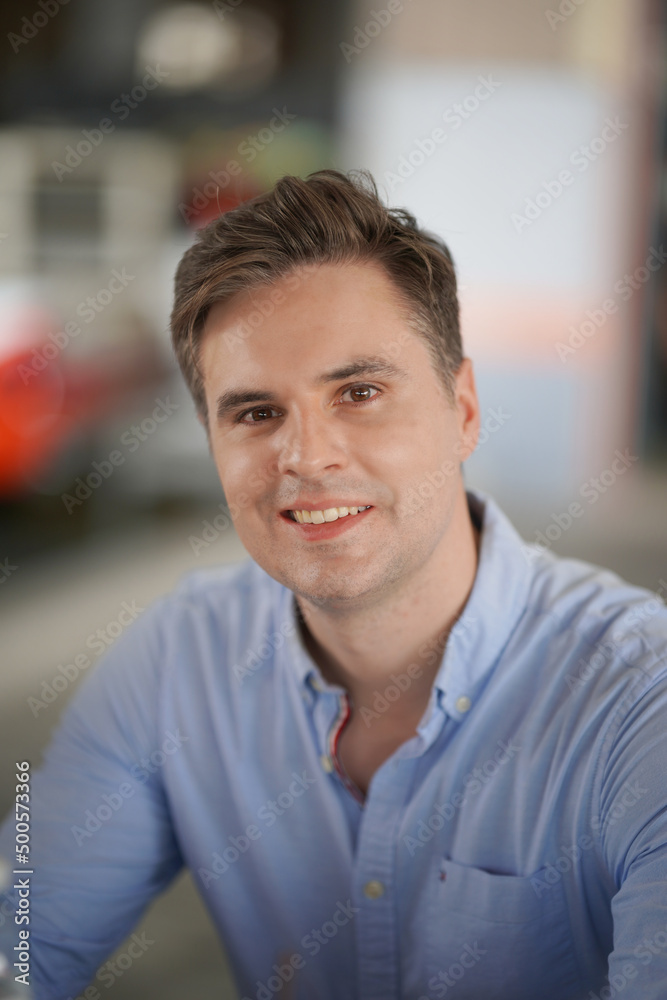 Naklejka premium Portrait of a young handsome confident on casual outfit standing outdoor.