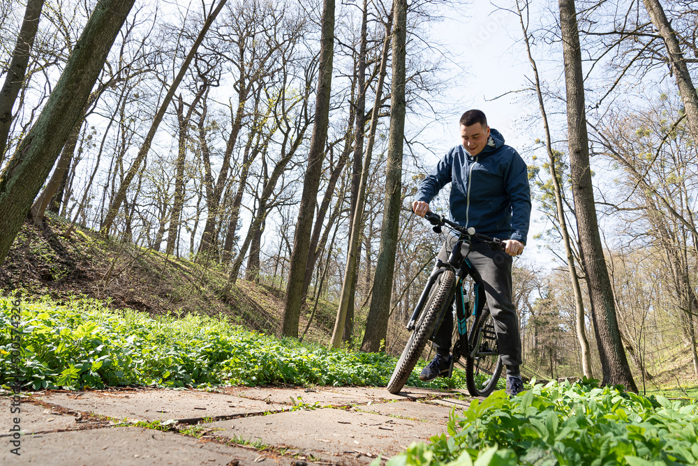 Naklejka premium Man riding a mountain bike
