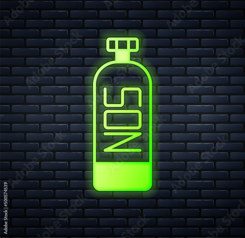 Glowing neon Nitrous oxide icon isolated on brick wall background. Vector