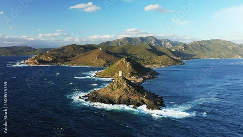 The Sanguinaires Islands at the foot of rocky peaks, in Europe, in France, in Corsica, towards Ajaccio, on the shores of the Mediterranean Sea, in summer, on a sunny day. photo