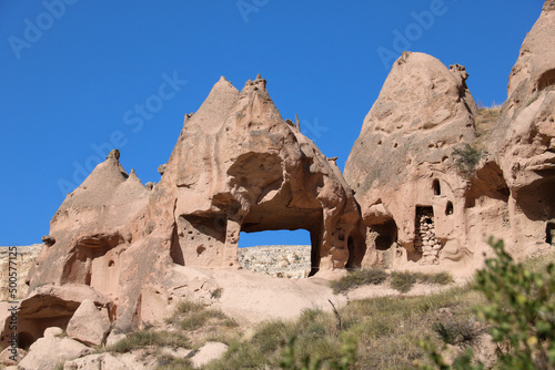 close view of fairy chimneys in tuff material in zelve open air museum photo
