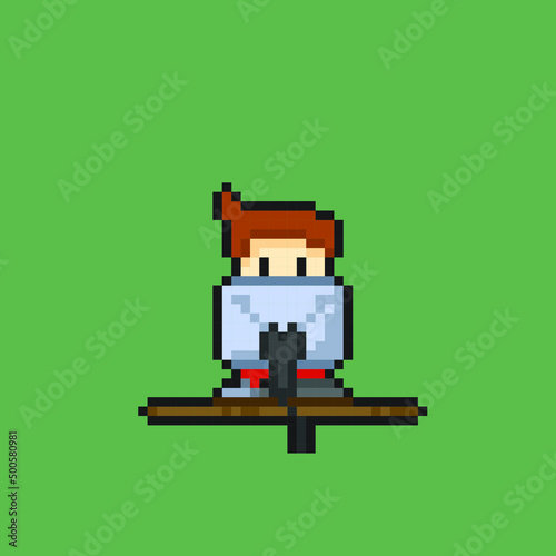 a man in front of computer in pixel art style