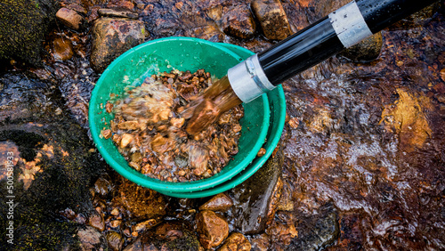 Wallpaper Mural Gold panning using a gravel pump Torontodigital.ca