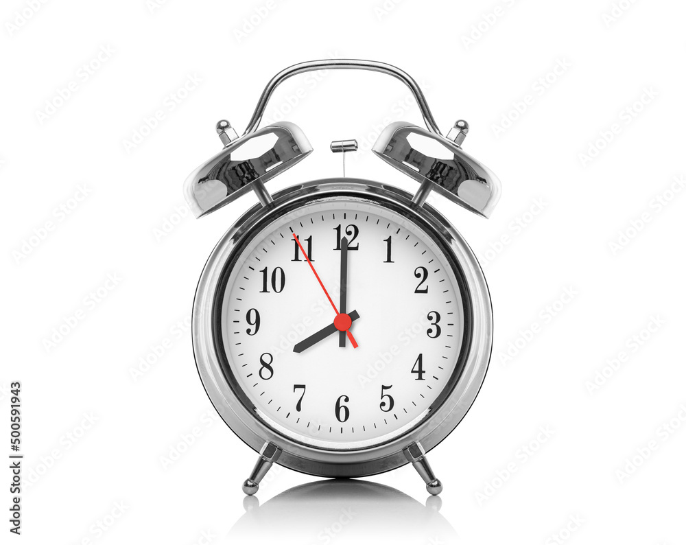 Alarm clock isolated on white background. Eight hours after midnight or noon. Twenty hours on the clock. Alarm clock isolated on white background. Eight hours after midnight or noon. Twenty hours on the clock.