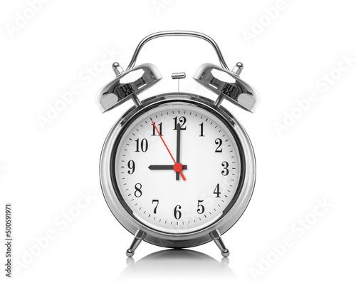 Alarm clock isolated on white background. Nine hours after midnight or noon. Twenty one hours on the clock.