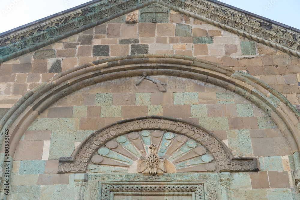 Close View Of Bas-Relief At The Exterior Facade Of Ancient Svetitskhoveli Monastery