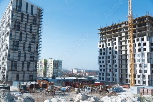 The architectural complex of residential buildings on sky background