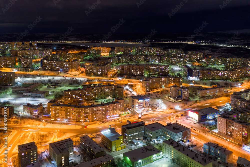 Aerial view of the town and Karl Marx street on polar night. Murmansk, Russia.