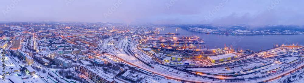 Panoramic aerial view of the town and Sea port on short winter day. Murmansk, Russia.
