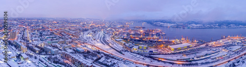 Panoramic aerial view of the town and Sea port on short winter day. Murmansk, Russia.