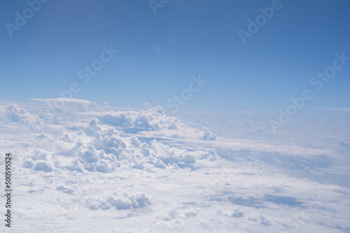 Beautiful blue sky background, white clouds. © Teerapat