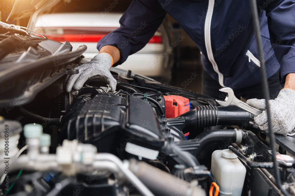 custom made wallpaper toronto digitalAutomobile mechanic repairman hands repairing a car engine automotive workshop with a wrench, car service and maintenance,Repair service.