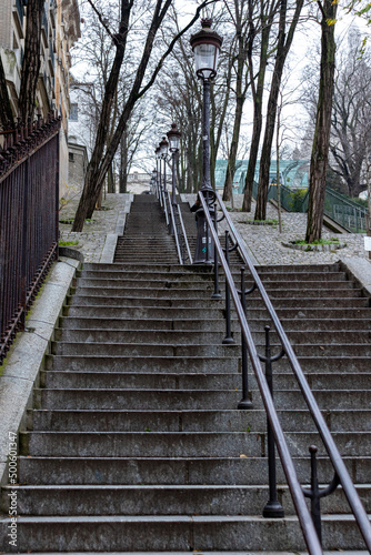 Fototapeta Naklejka Na Ścianę i Meble -  Staircase on Montmartre hill, Paris, France in January