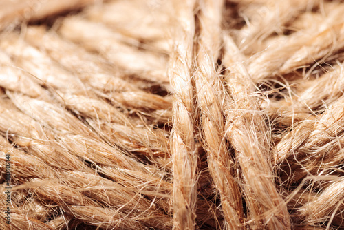 Texture brown skein of jute rope close-up macro photography