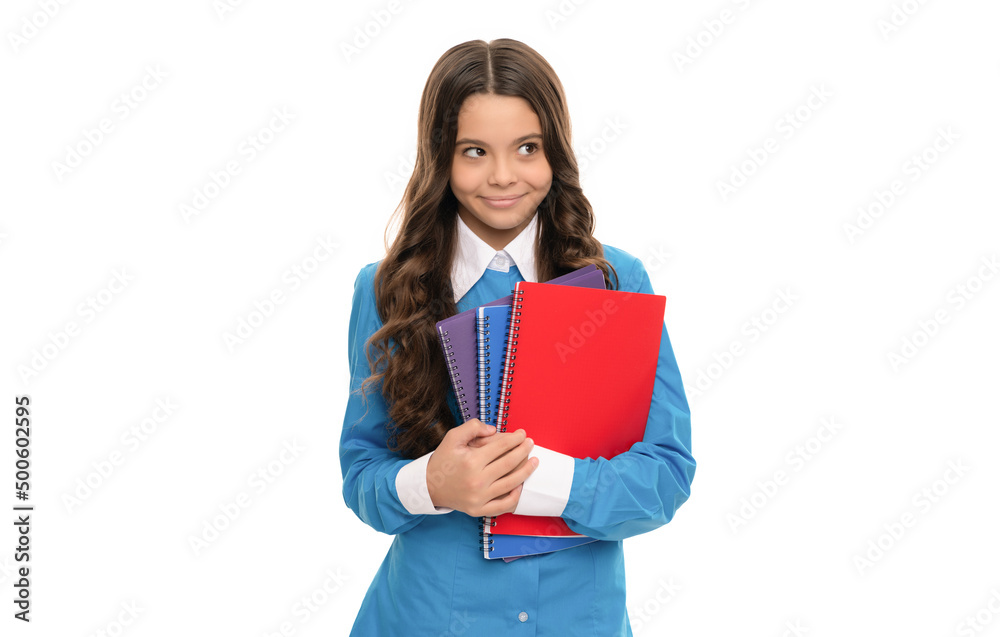 smiling kid portrait has long curly hair with school workbook isolated on white, school