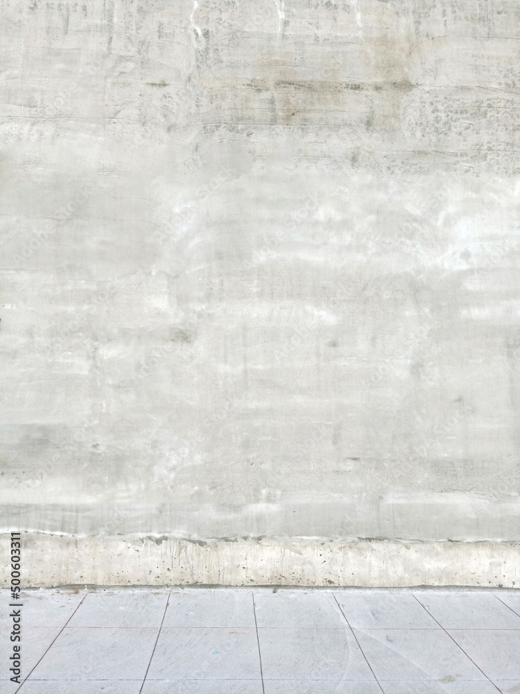 Fototapeta premium Perfect street background with space.gray cement wall and gray tile floor