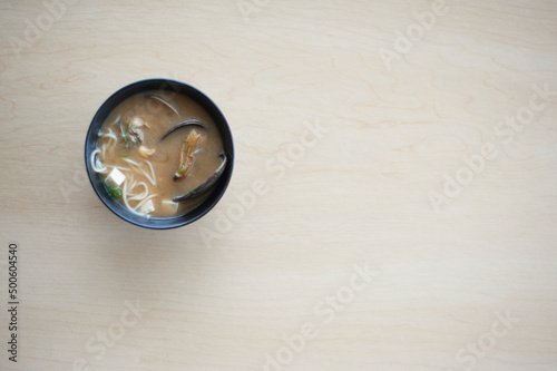 miso soup with clams, tofu and noodle
 photo