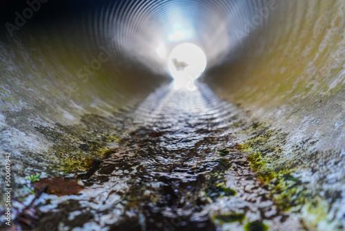 water flowing into the tunnel