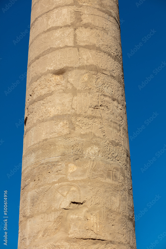 Different columns with hieroglyphs in Karnak temple. Karnak temple is the largest complex in ancient Egypt.