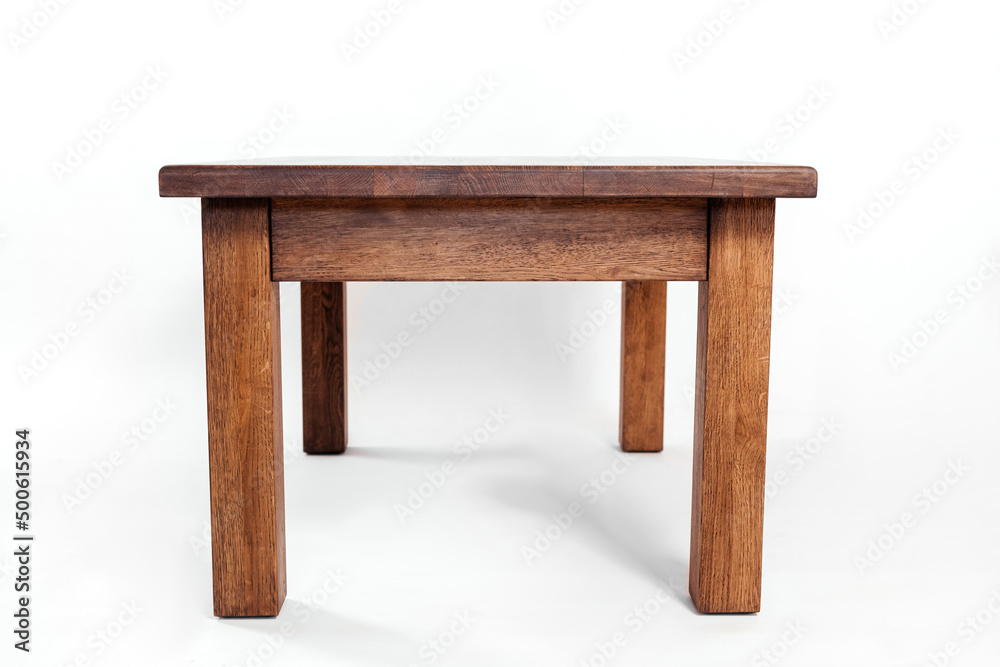 handmade wooden table on a white background with all the details handmade wooden table on a white background with all the details