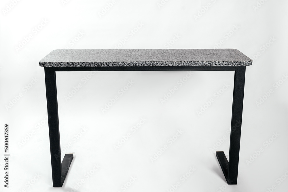 Granite table on metal racks on a white background
