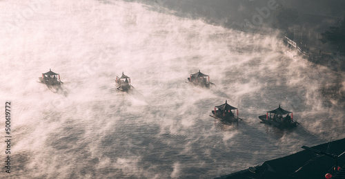 Sunrise with fog over Ban Rak thai, chinese village near a lake in Mae Hong Son, Thailand