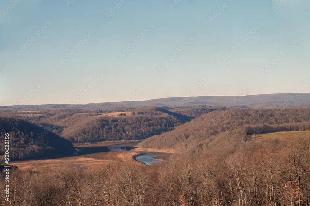 Youghiogheny River Meandering Through Valley of Fields and Trees in Winter with Blue Sky Landscape