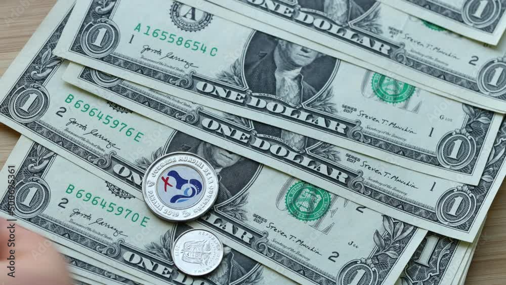 Panama money, folded American dollars lying on the table and coins called Balboa. Concept, financially business related to the Home budget Panama money, folded American dollars lying on the table and coins called Balboa. Concept, financially business related to the Home budget