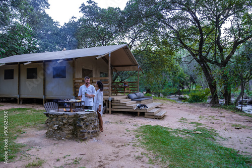 Budget Safari tent in South Africa for family vacations in the nature , couple man and woman camping safari tent photo