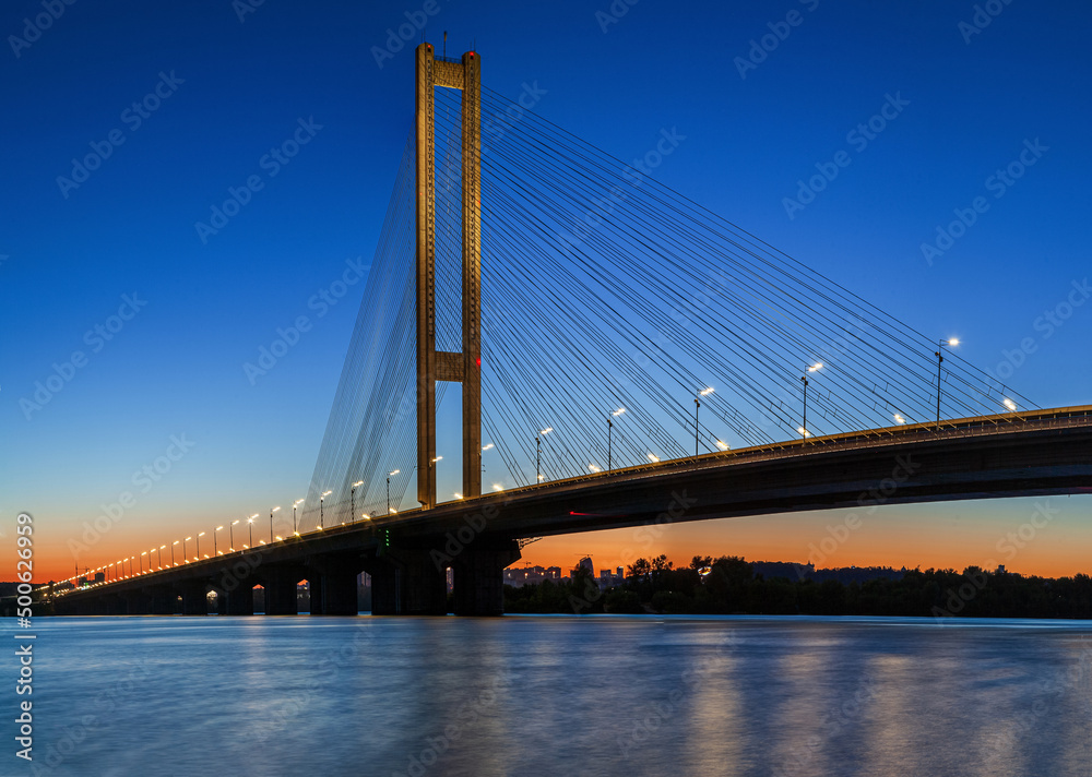 Cable-stayed bridge South in the city of Kyiv. The highest bridge in Ukraine, the height of the pylon is 136 meters. Focus is in the center of the photo on the bridge pylon. Cable-stayed bridge South in the city of Kyiv. The highest bridge in Ukraine, the height of the pylon is 136 meters. Focus is in the center of the photo on the bridge pylon.