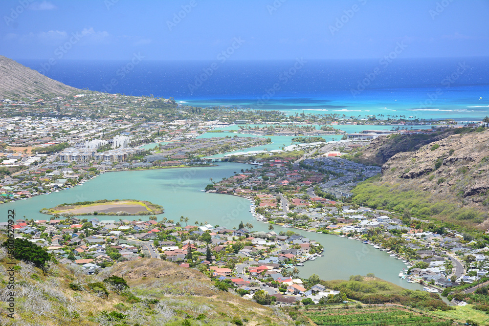 Hiking in Hawaii Kai area with view of Kokohead crater and harbor in Honolulu on Oahu