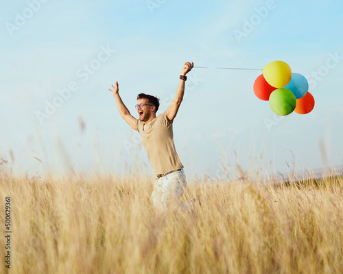 man summer fun lifestyle balloon outdoor community field joy pride lgbt run cheerfu playing happy freedom