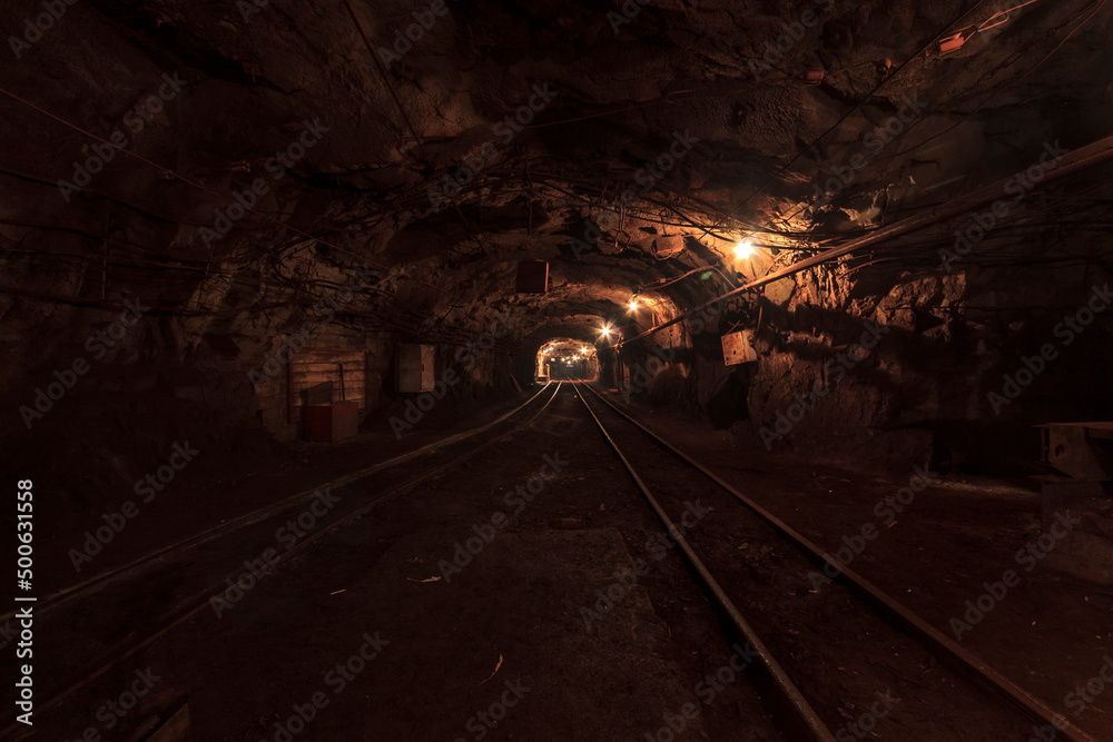 Naklejka premium Extraction of iron ore underground in the bowels of the mine.