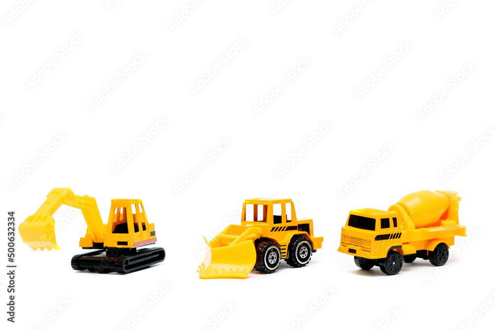 Naklejka premium Little mini yellow plastic concrete mixer,excavator tractor,truck lorry,car automobile toy isolated on white background mockup with copy space,toys for children,kids development,playing,childhood fun