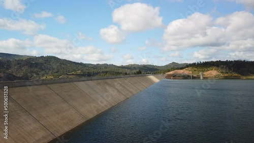 Kannaviou Dam and reservoir, Cyprus, with sunshine and clouds photo