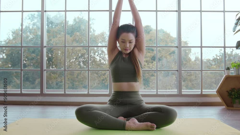 Fit young woman doing yoga and meditation at home, sport and healthy lifestyle concept. Fit young woman doing yoga and meditation at home, sport and healthy lifestyle concept.