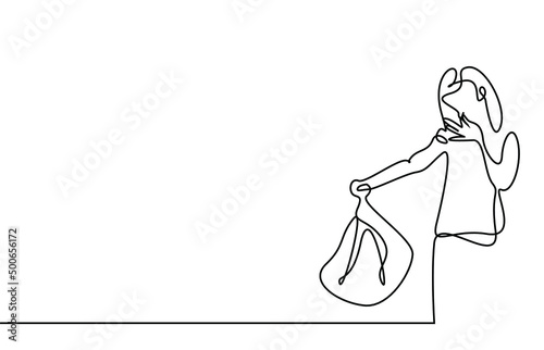 a woman holds a smelly garbage bag and covers her nose with her other hand