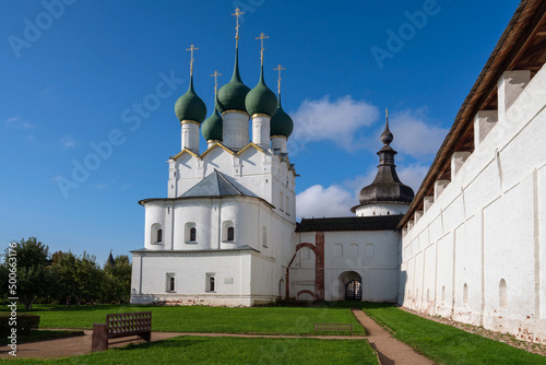 View of the Church of St. Gregory the Theologian on the territory of the Metropolitan Garden of the Rostov Kremlin and the Grigoriev Tower, Rostov the Great, Yaroslavl region, Russia photo