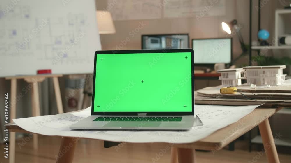Close Up Of Green Screen Laptop Is On The Table At The Architectural Office
Close Up Of Green Screen Laptop Is On The Table At The Architectural Office