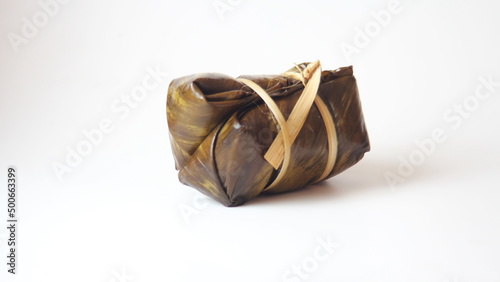 Thailand rice cakes bundle wrapped banana leaves on a white background