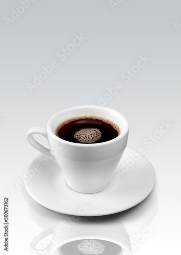White ceramic cup with coffee on a pastel background
