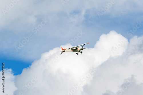 Aircraft flying in the clouds in the sky