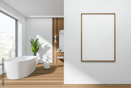 Bathroom interior with bathtub and panoramic window. Mockup frame